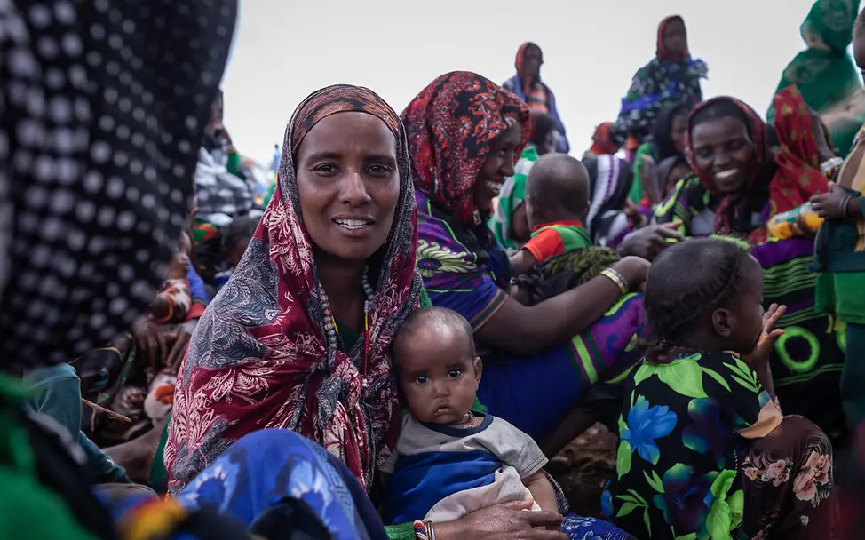 Eine Mutter mit Kleinkind in Äthiopien Eine Mutter mit Kleinkind auf dem Arm