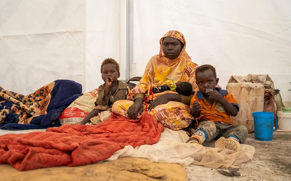 Hasniya ist mit ihren Kindern aus Kordofan geflohen. | © UNICEF/Saif Hasniya ist mit ihren Kindern aus Kordofan geflohen.
